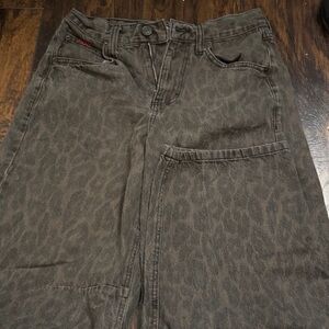 Urban Outfitter’s BDG Logan Leopard Printed Buckle Baggy Barrel Jean